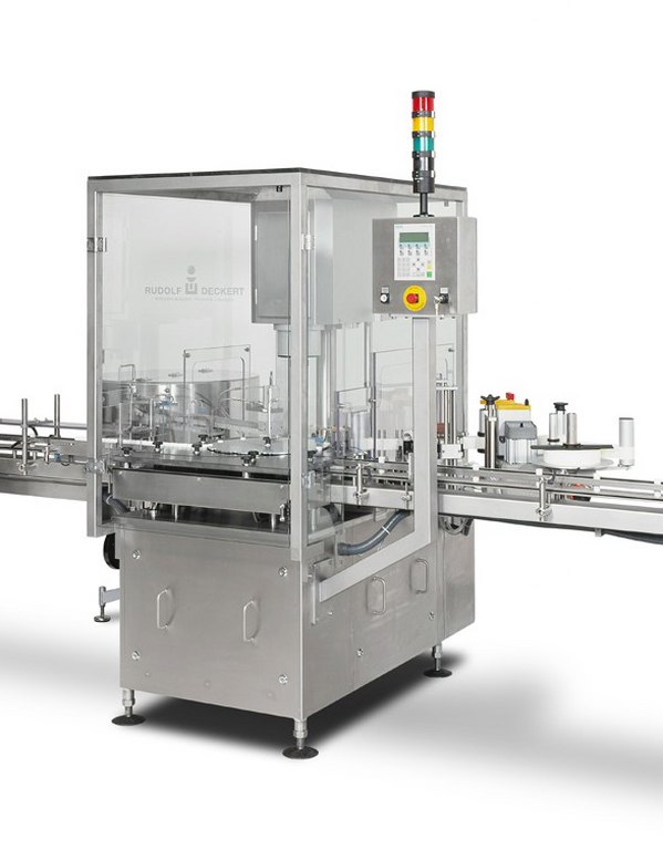 Rotary Capper with integrated Labelling station Raupack UK and Ireland